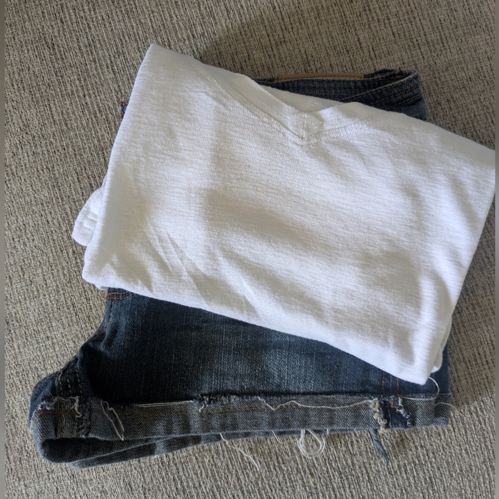 Woman's Cute Shorts And A White V Neck Tee Shirt.